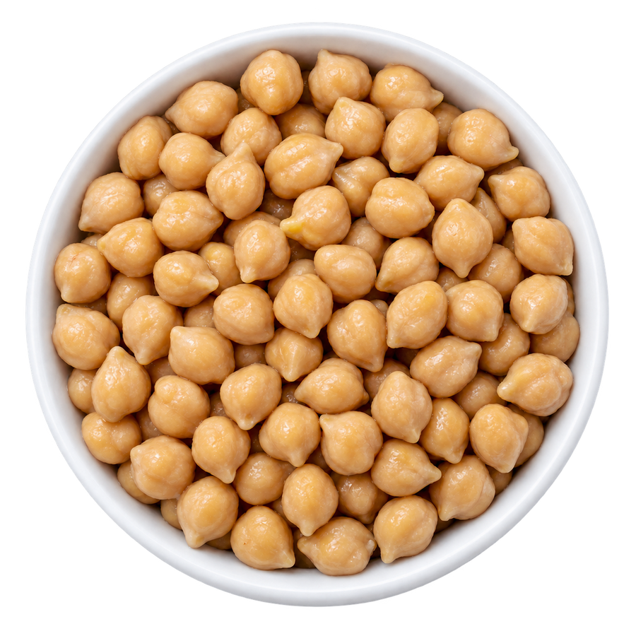 Overhead view of plain cooked Kabuli chana chickpeas in a white ceramic bowl